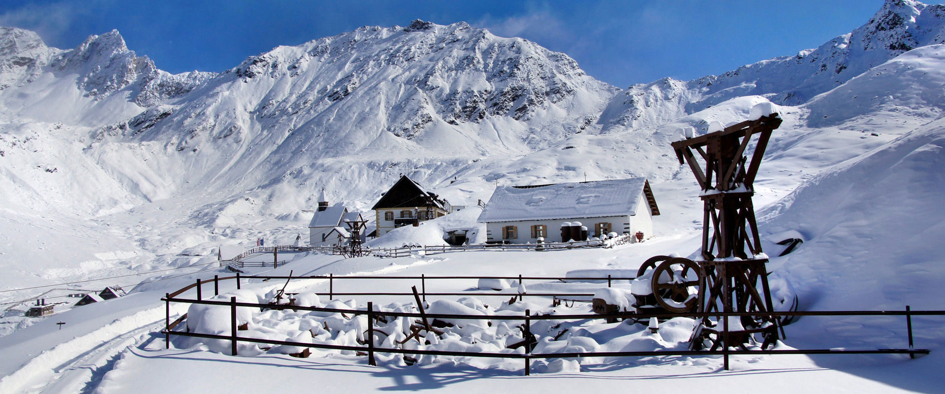 Refuge Schneeberg Snow-covered refuge Schneeberg and church Maria Schnee.