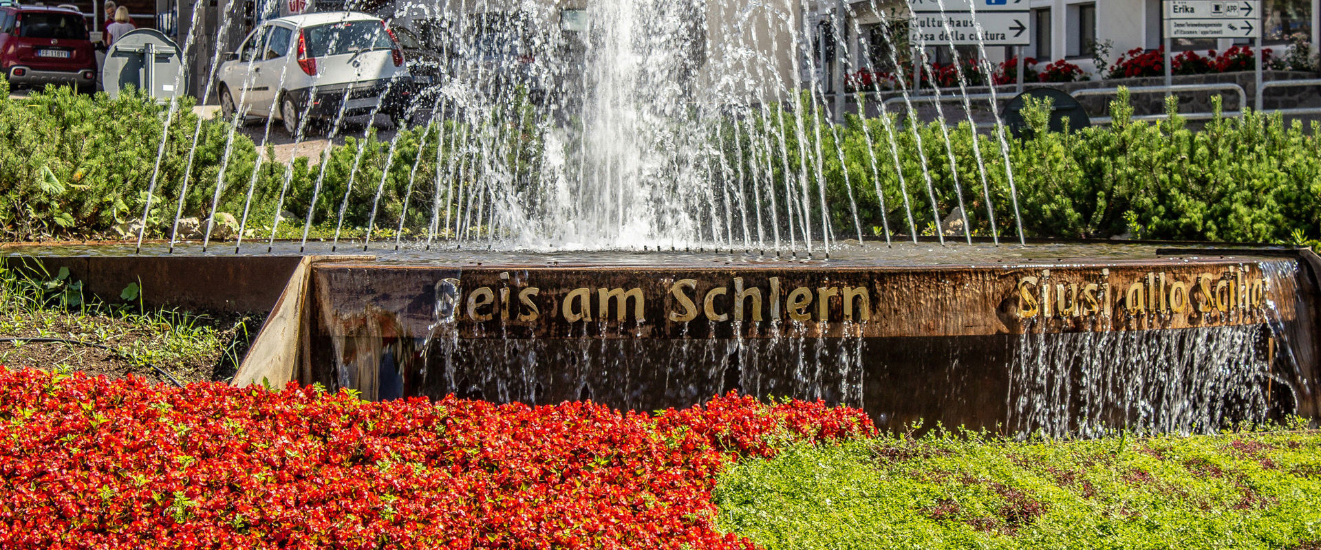 Seis am Schlern Fountain with the inscription Siusi allo Sciliar.