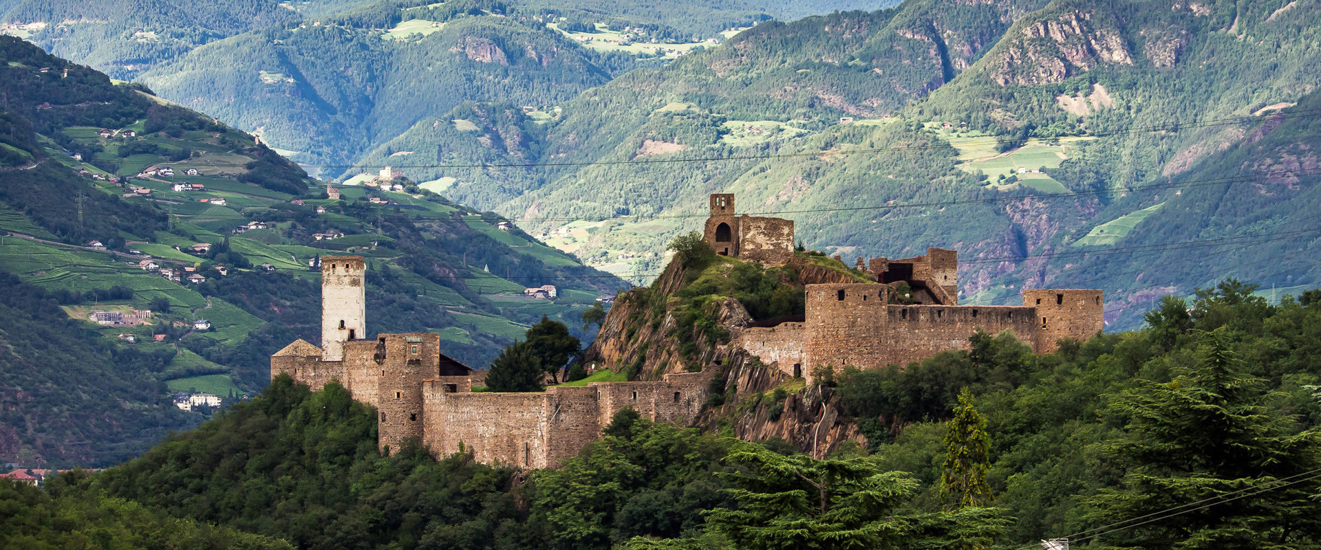 Sigmundskron Castle  Panoramic photo of Sigmundskron Castle and the surrounding mountains.