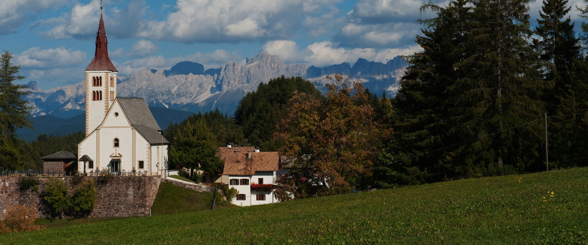 Petersberg Petersberg parish church with Dolomites scenery