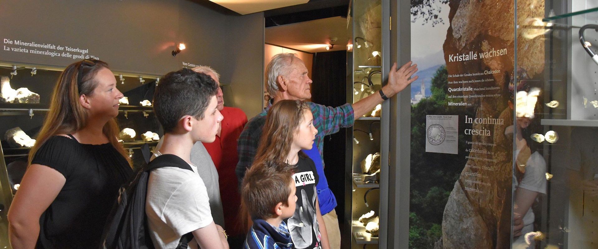 Group looking at the information boards in the museum.