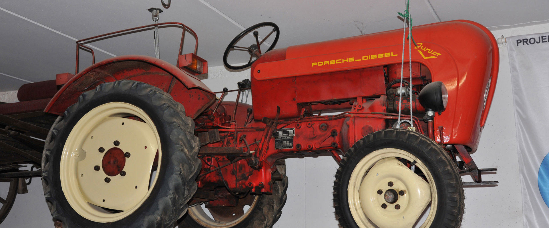 Exhibition of an old red tractor.