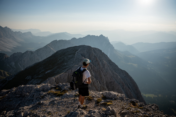 Hiker breathtaking view of the Dolomites.