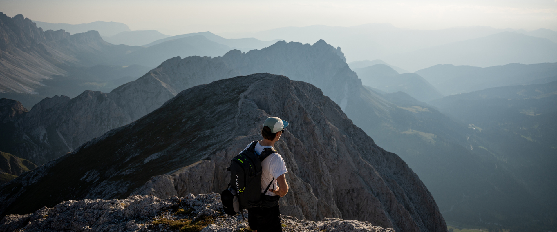 Hiker breathtaking view of the Dolomites.