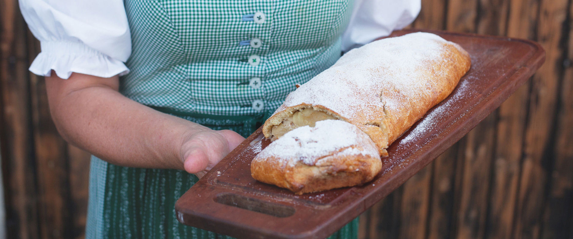 Apple strudel Woman holding homemade apple strudel.