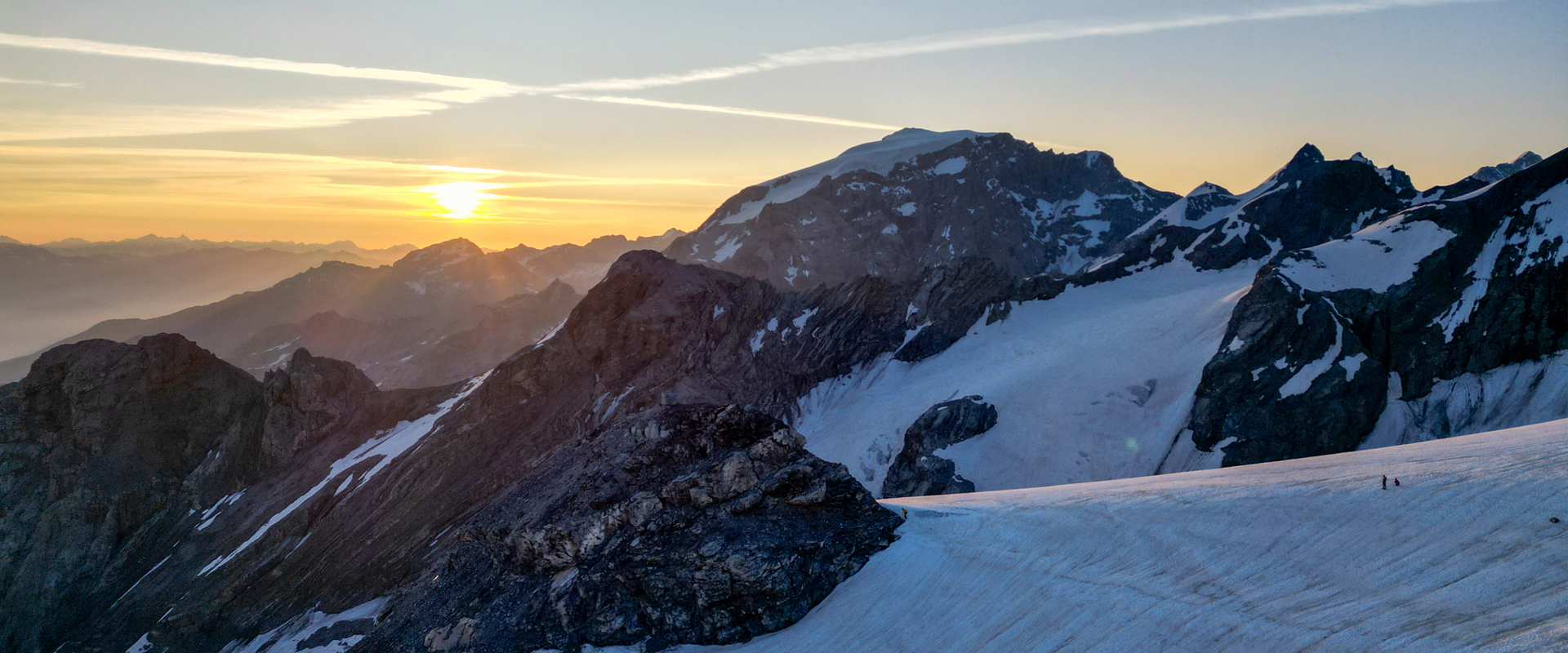 Sunrise over the snow-covered peaks of a glacier