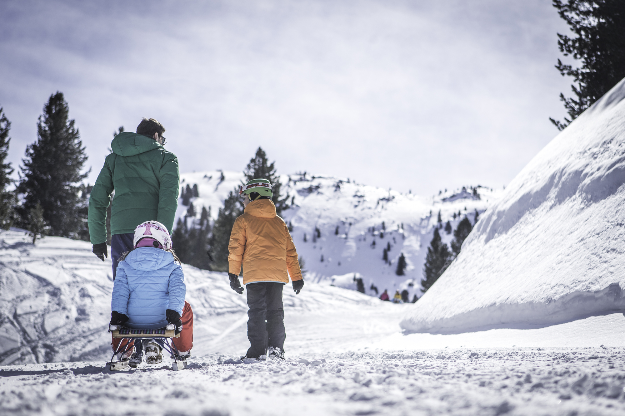 A family on the toboggan run at Speikboden.