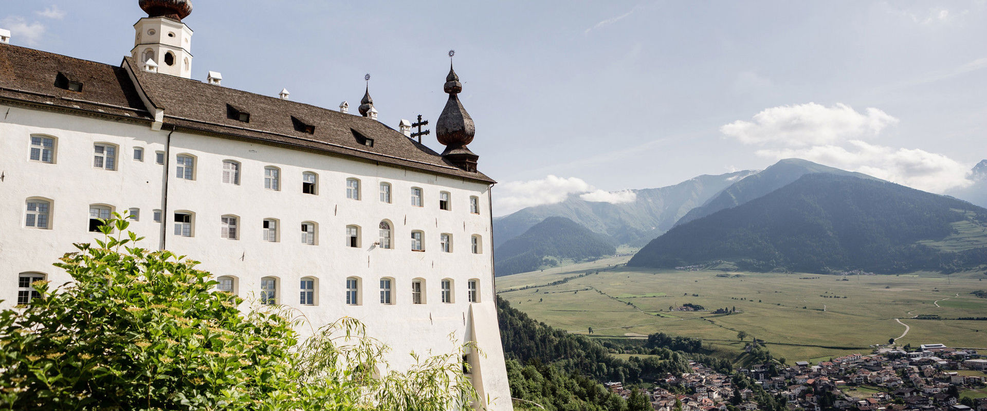 The Marienberg Abbey The monastery is situated on a hill overlooking the village slightly below.