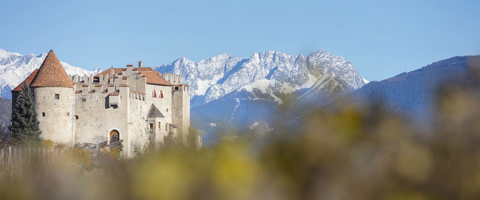 Kastelbell Castle in the Vingschau Valley. View of Kastelbell Castle and the surrounding area.